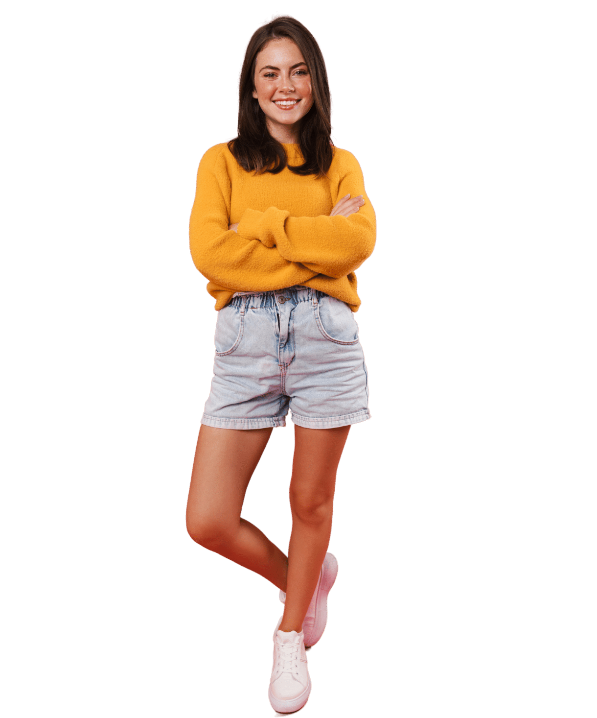 Woman in yellow sweater looking forward and smiling